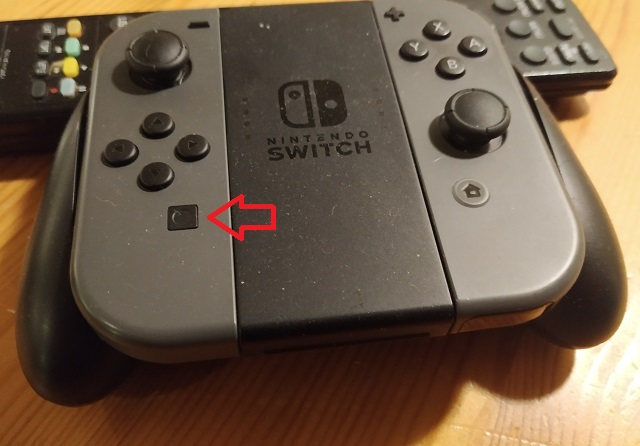 Nintendo switch joy con med knappen du trenger for å ta skjermbilde